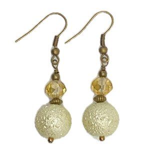 Dangle Earrings with Frosted Cream Beads, Faceted Glass Beads, and Antique Brass